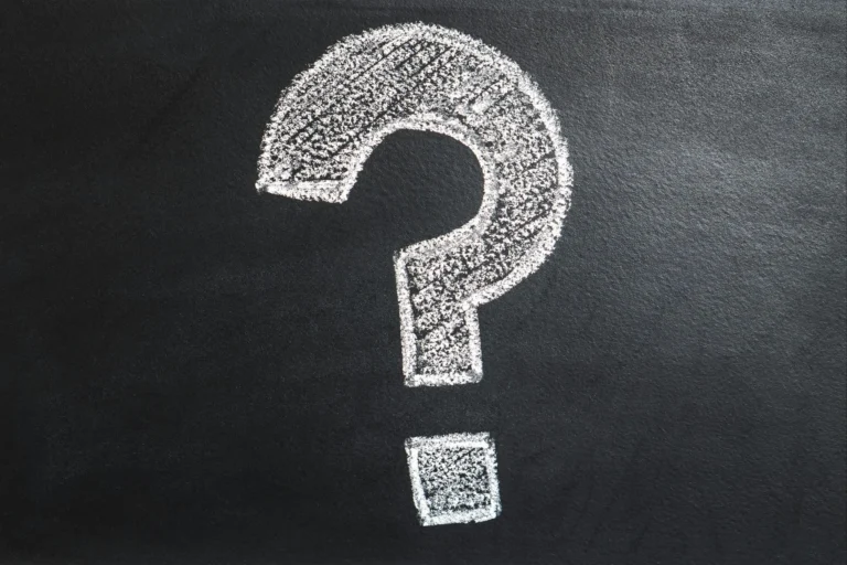 image of a question mark in chalk on a blackboard representing the question, What is a psychological formulation? answered by a blog from national clinical psychology service uk