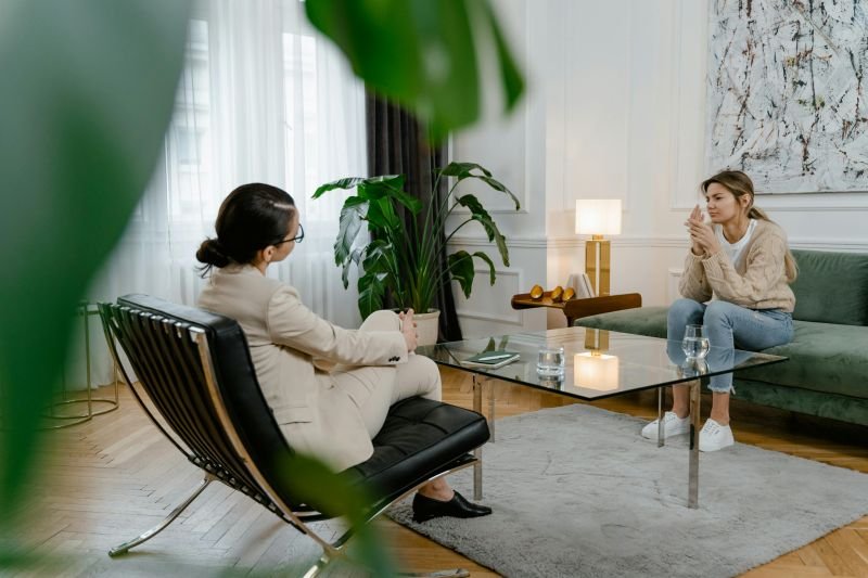 image of two people talking in a clinical psychology setting